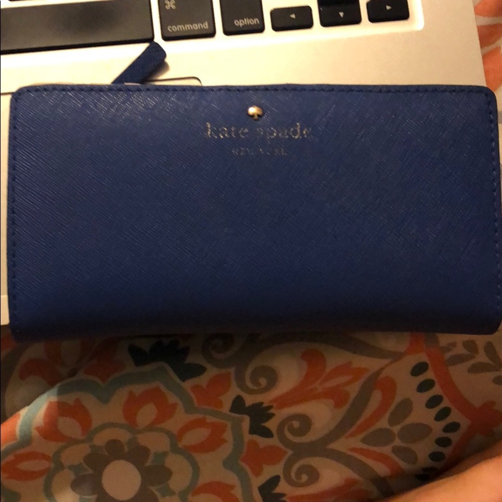 Kate spade wallet in mid condition!